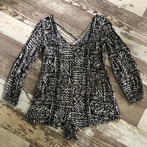 Billabong romper with strappy back.